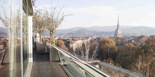 Penthouse of 320 mqs with terraces in Hollywood House, in front of the Royal Gardens (Giardini Reali)