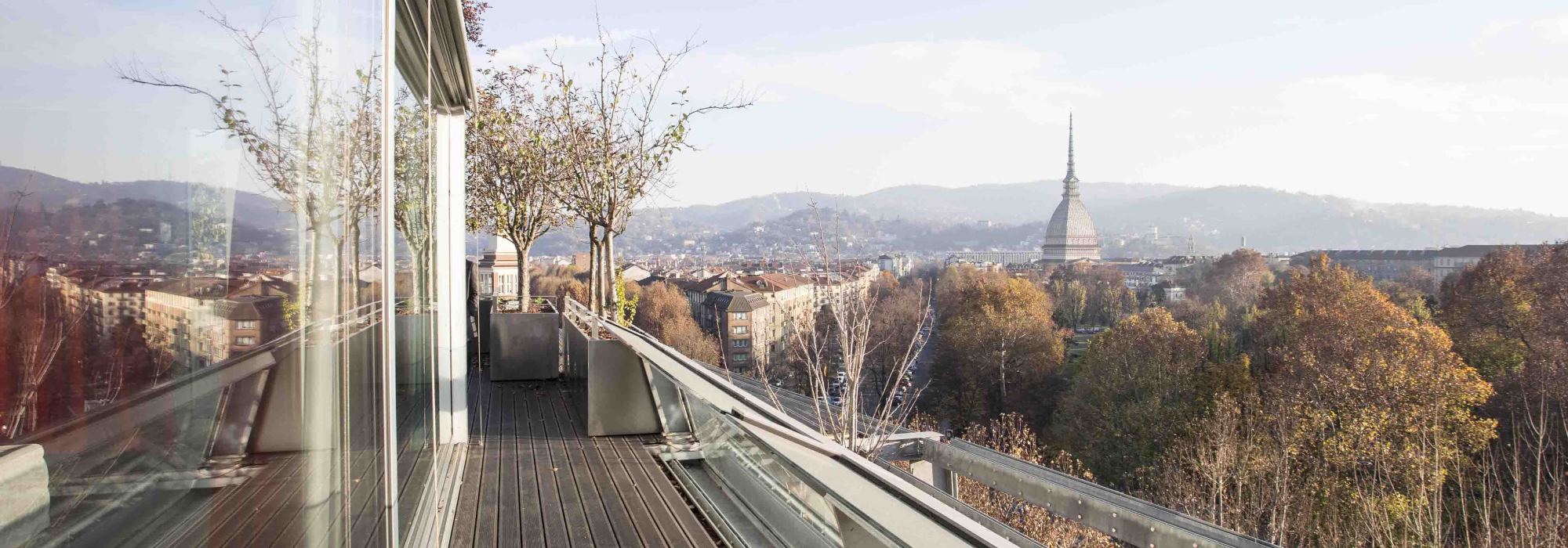 Penthouse of 320 mqs with terraces in Hollywood House, in front of the Royal Gardens (Giardini Reali)